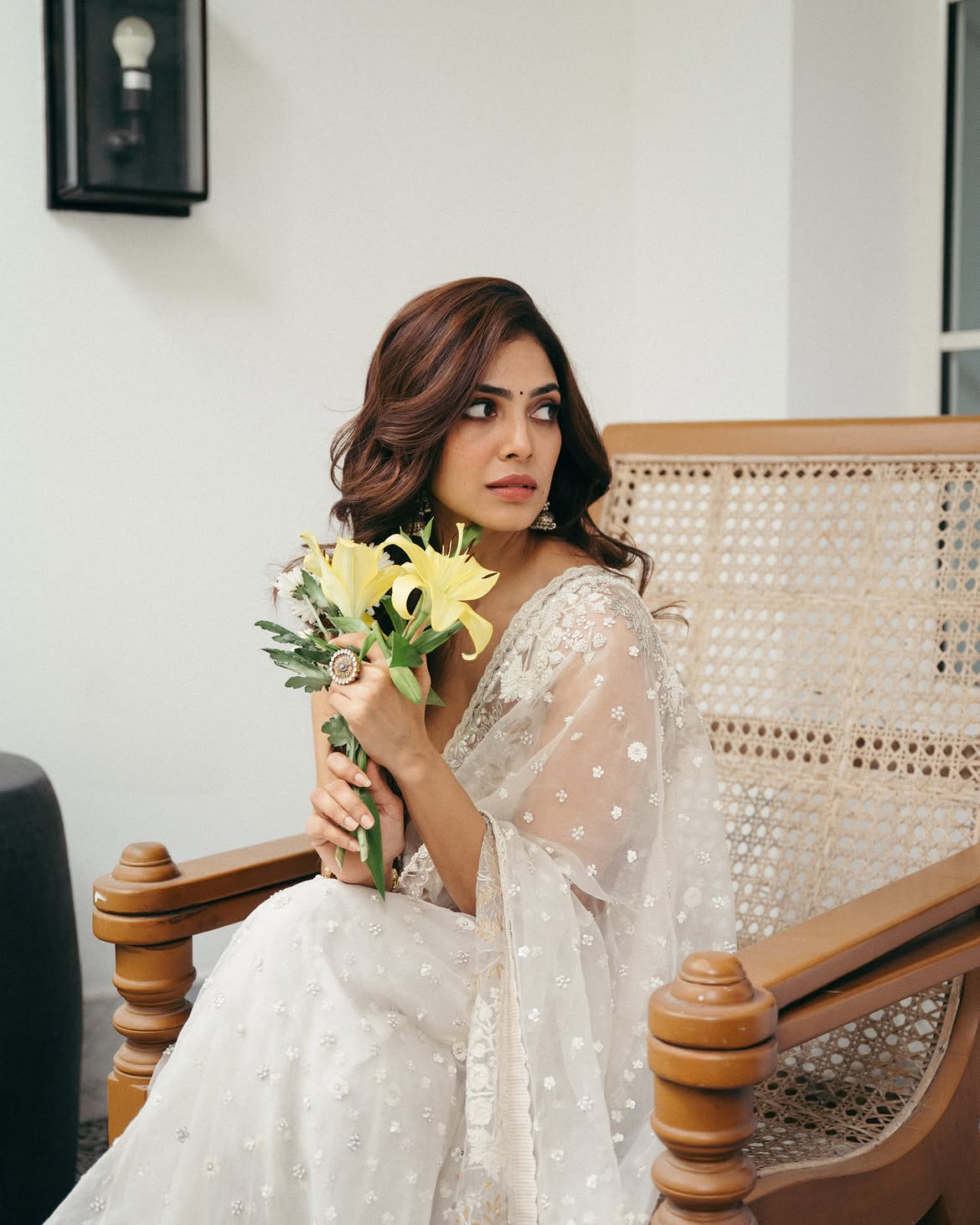 Malavika Mohanan Shows her Beauty in Transparent White Saree