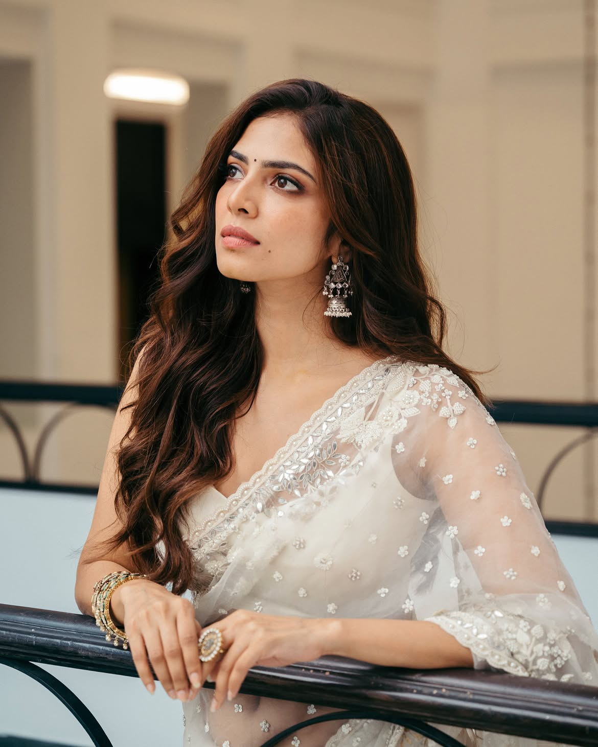 Malavika Mohanan Shows her Beauty in Transparent White Saree