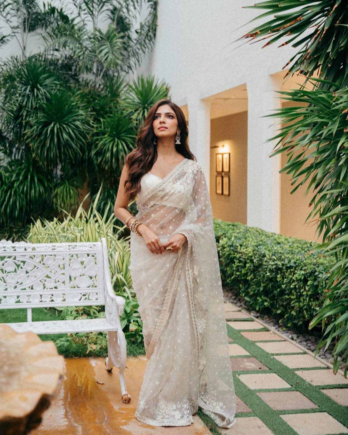 Malavika Mohanan Shows her Beauty in Transparent White Saree