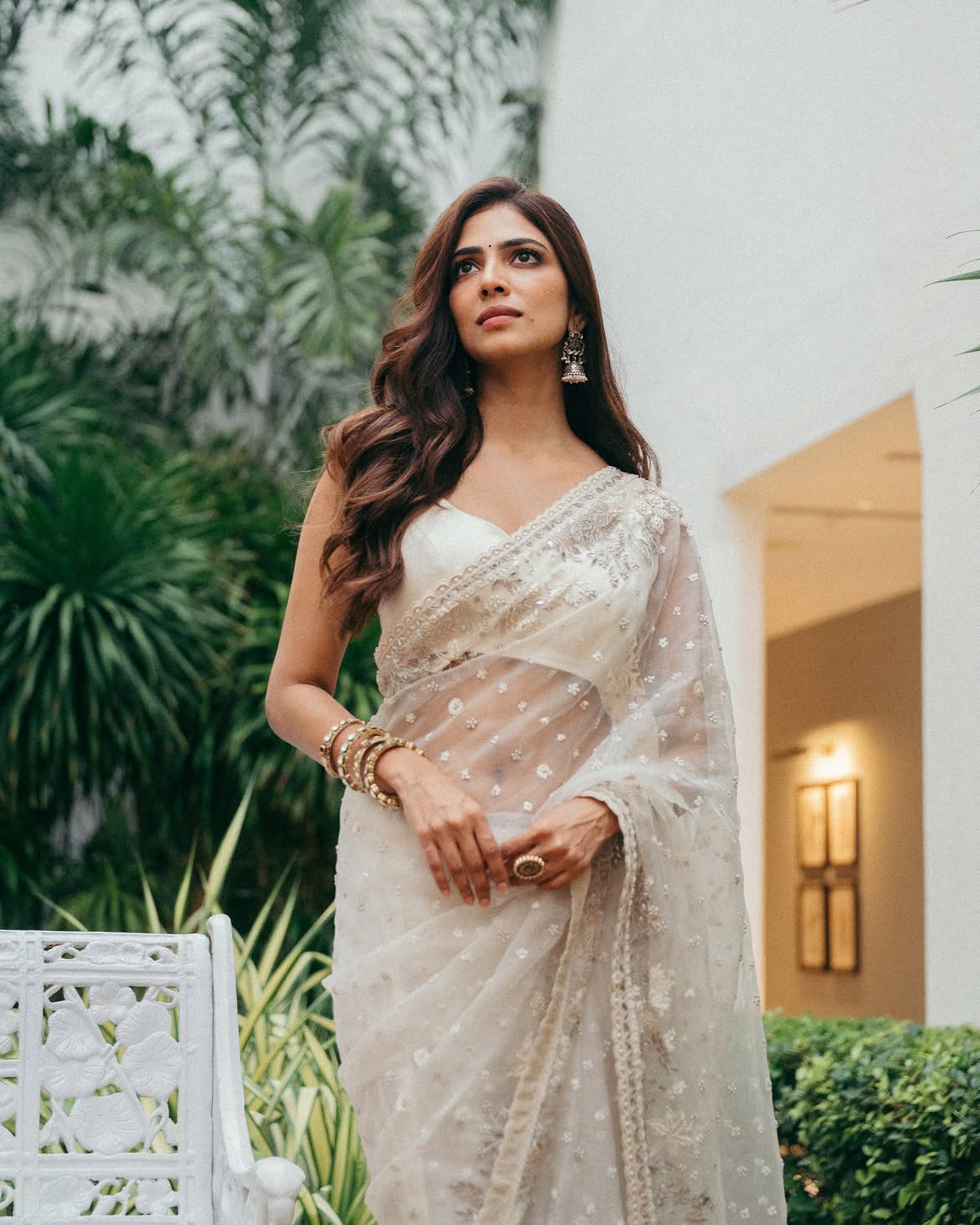 Malavika Mohanan Shows her Beauty in Transparent White Saree