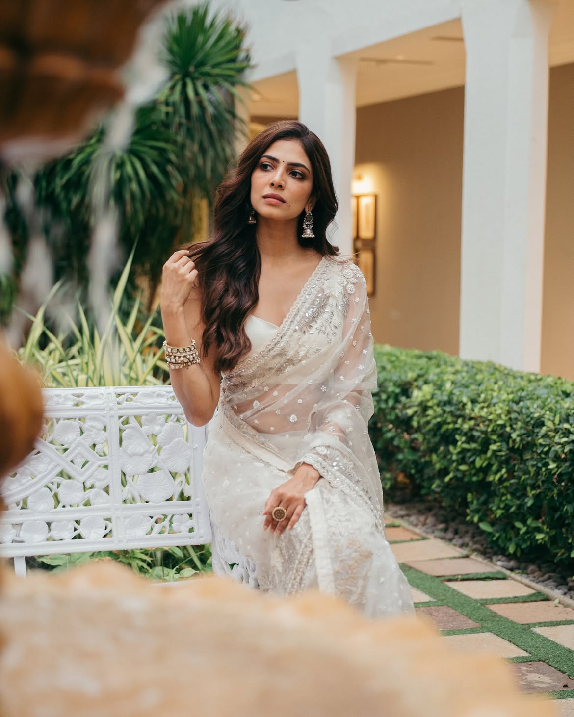 Malavika Mohanan Shows her Beauty in Transparent White Saree