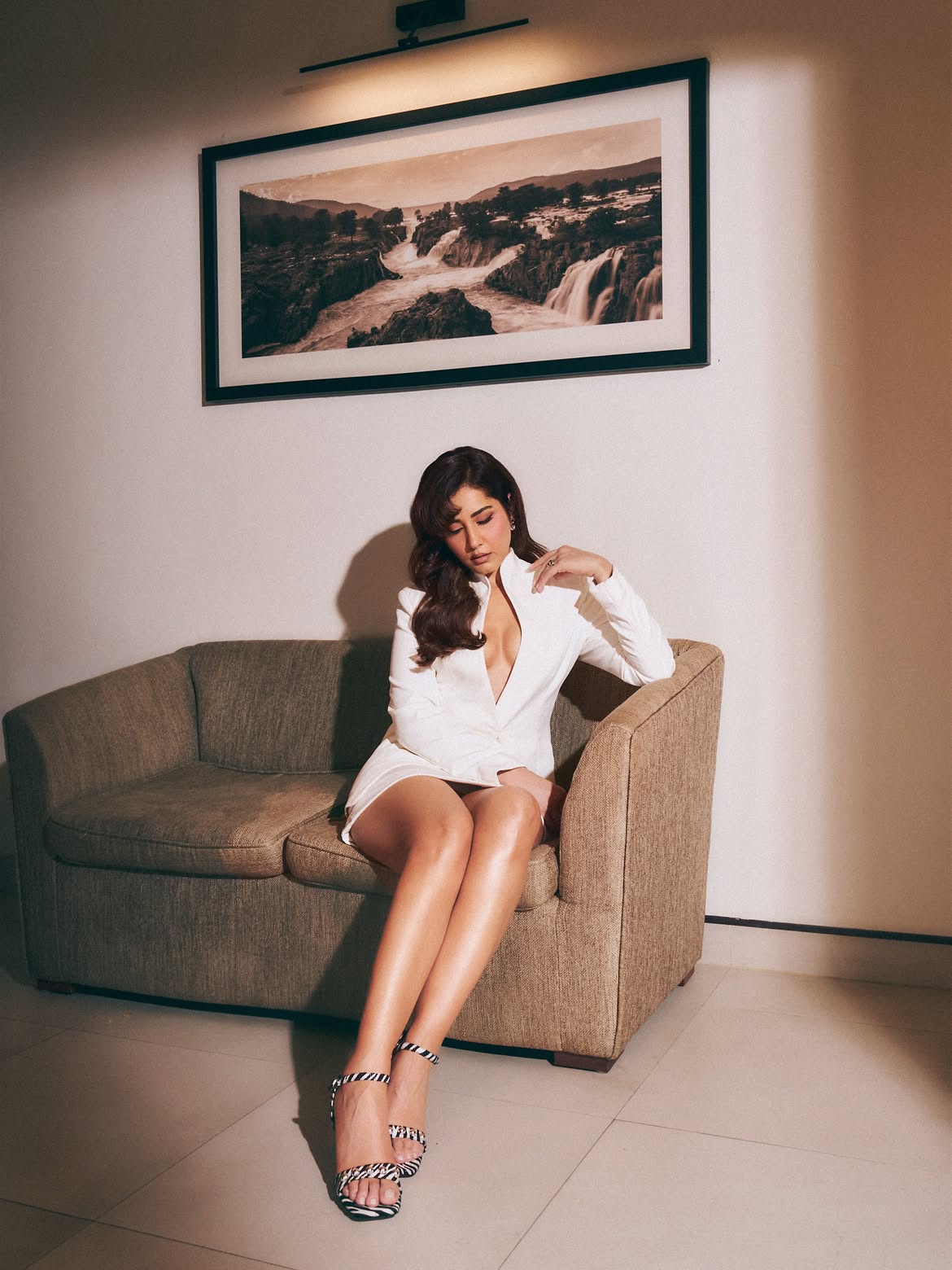 Raashii Khanna Sizzling Poses in White Dress