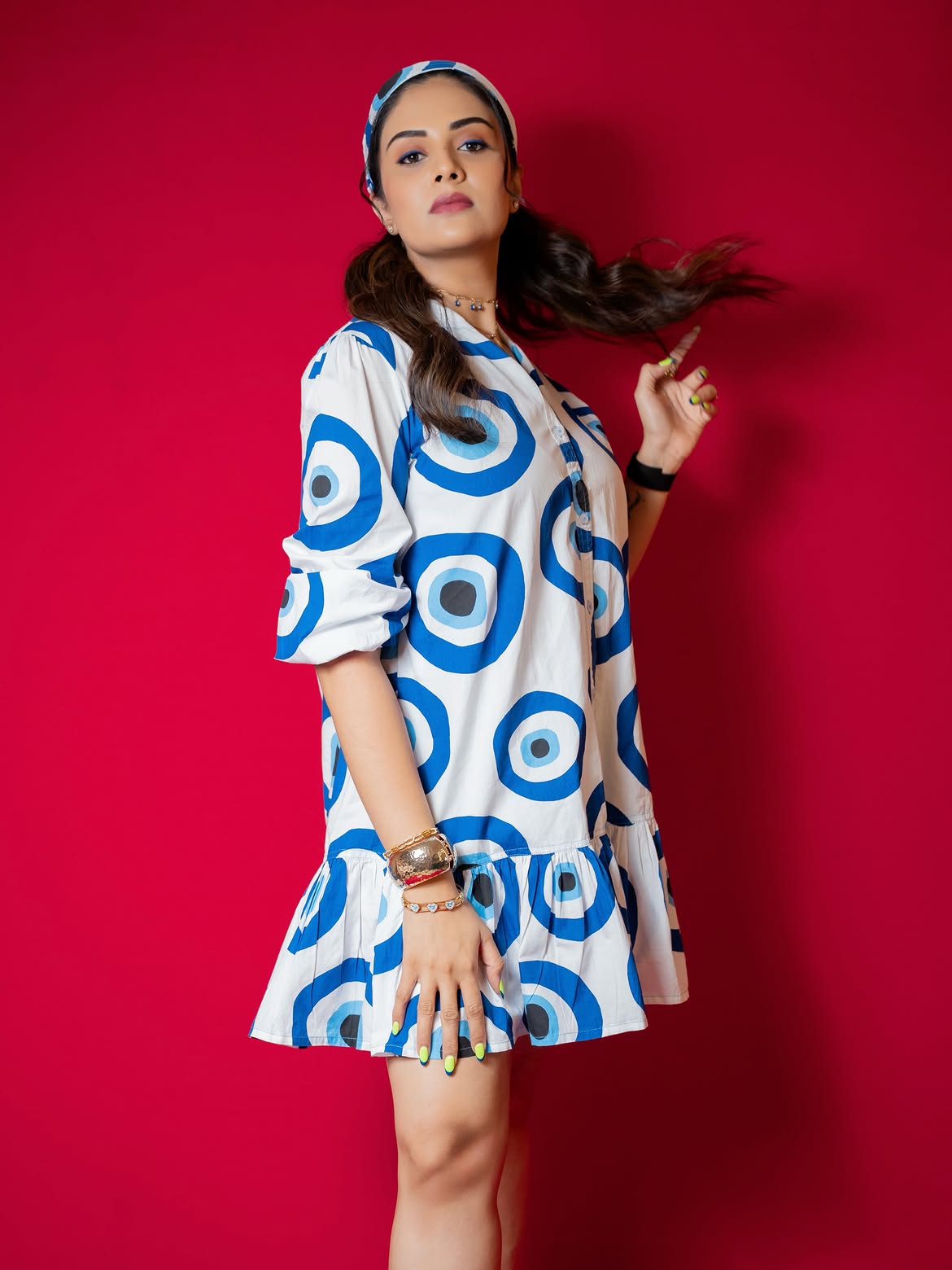 Anchor Sreemukhi Poses in Gown