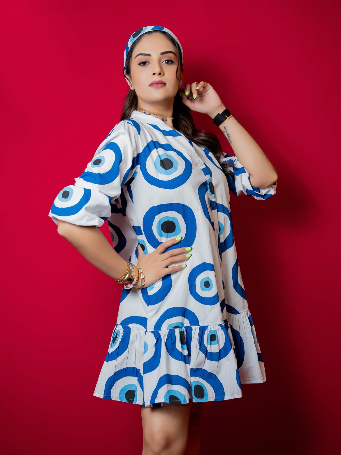 Anchor Sreemukhi Poses in Gown