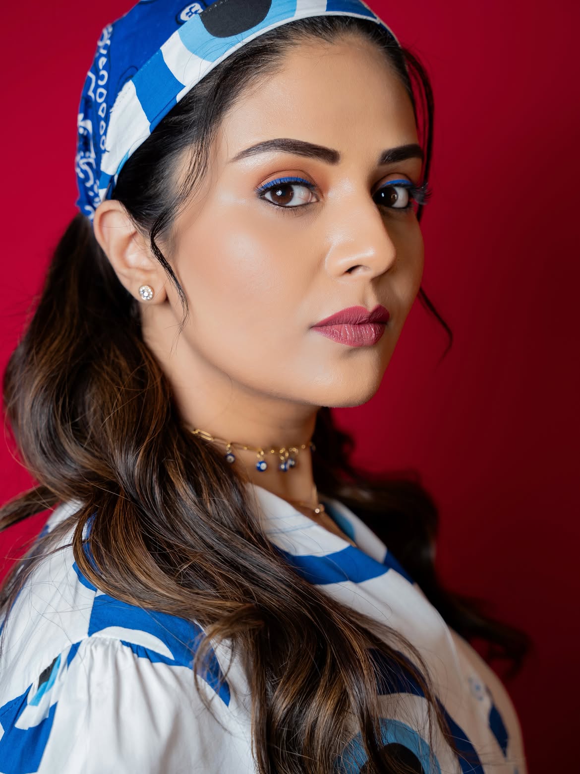Anchor Sreemukhi Poses in Gown