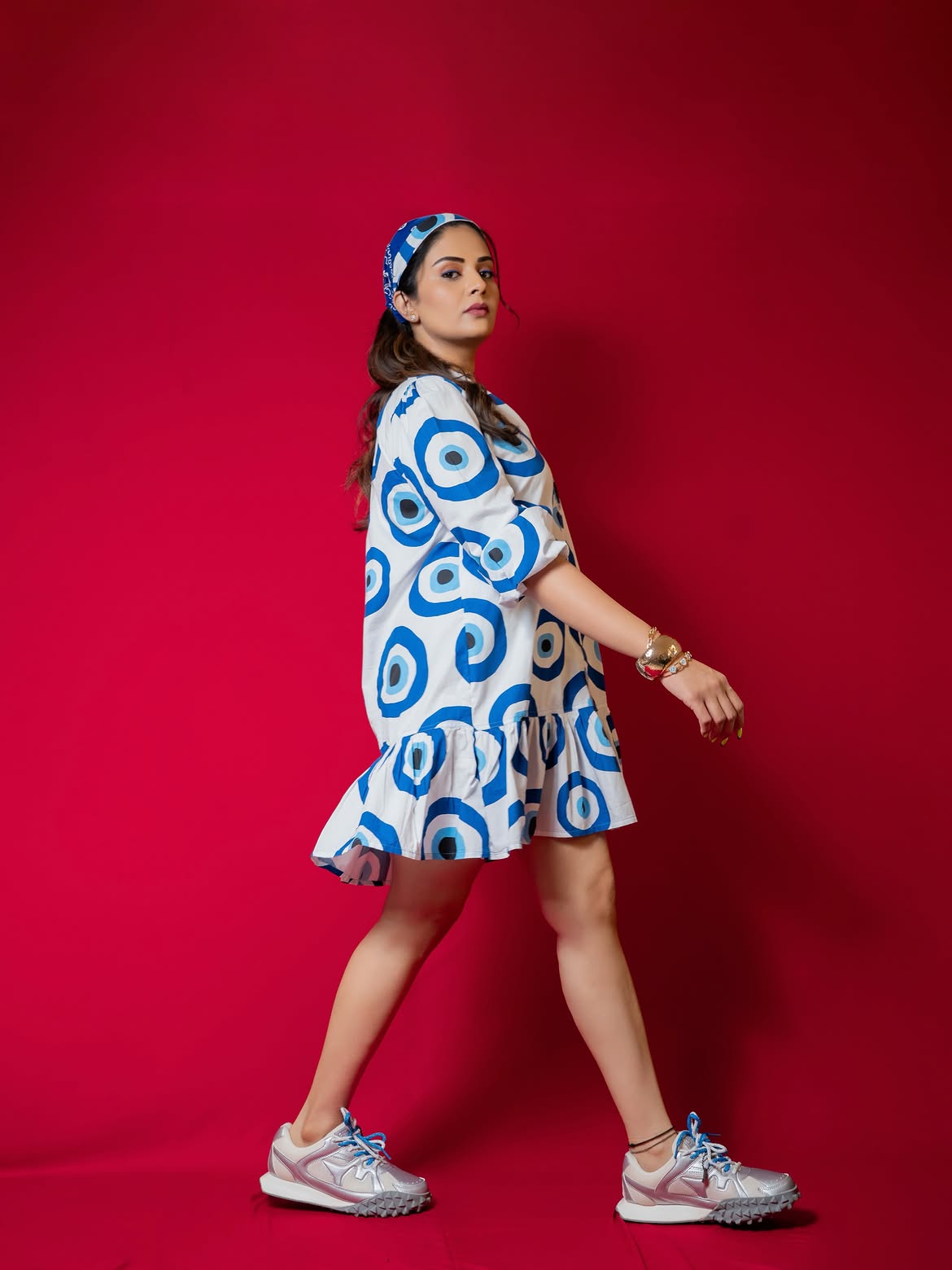 Anchor Sreemukhi Poses in Gown