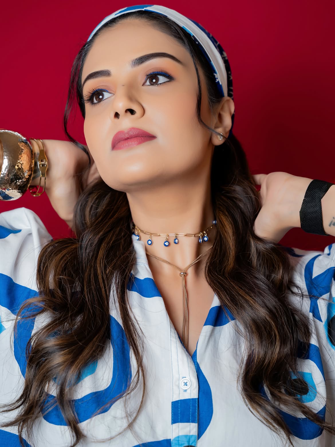 Anchor Sreemukhi Poses in Gown