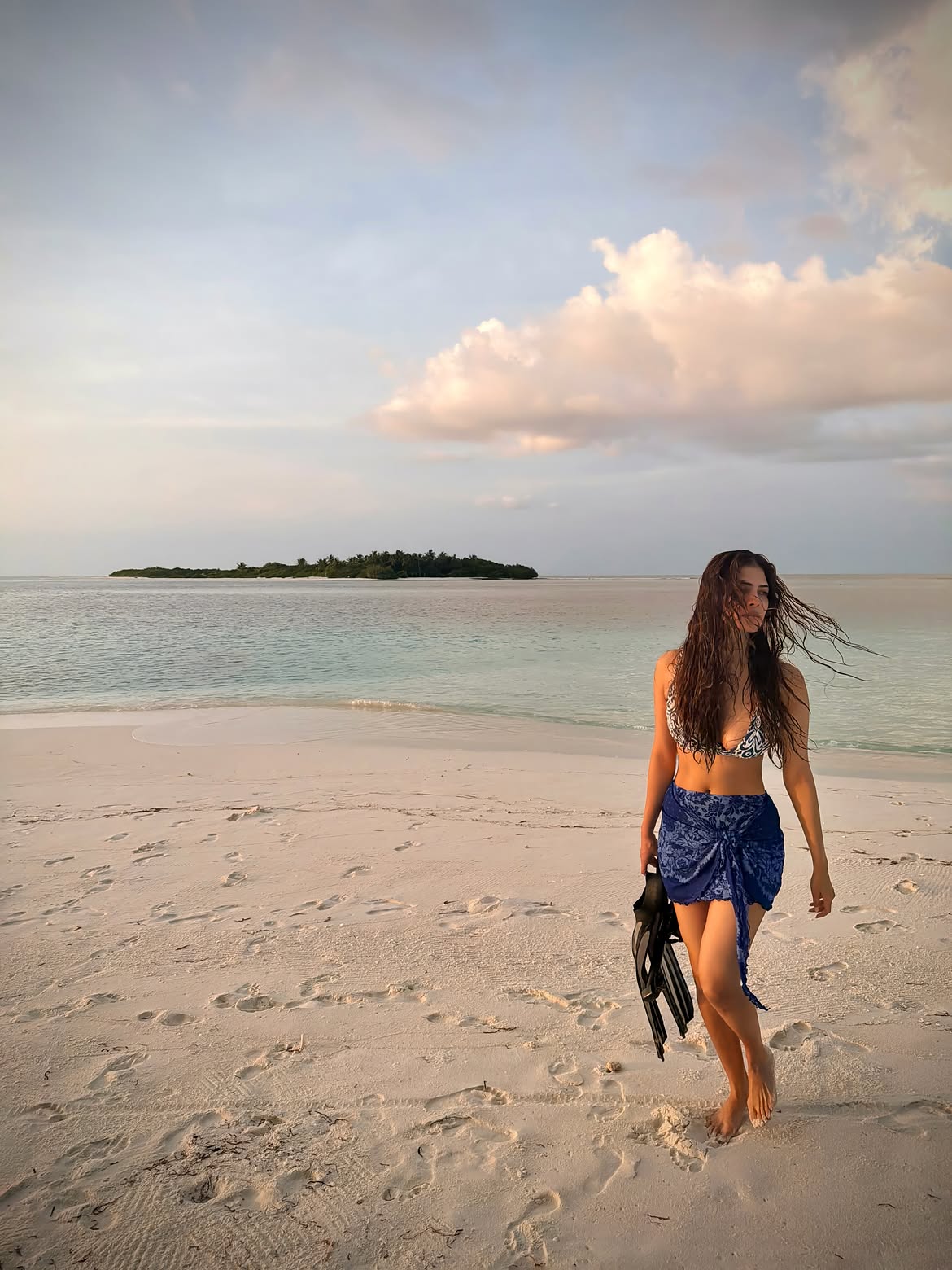 Malavika Mohanan Enjoying Vacation in Beach