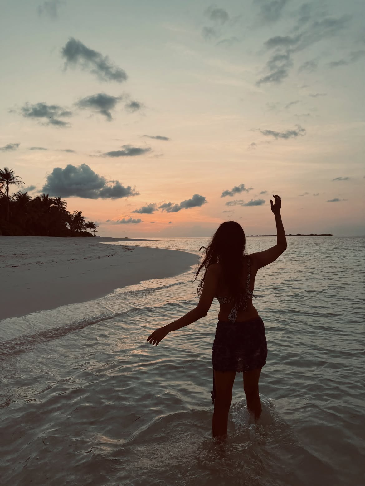 Malavika Mohanan Enjoying Vacation in Beach