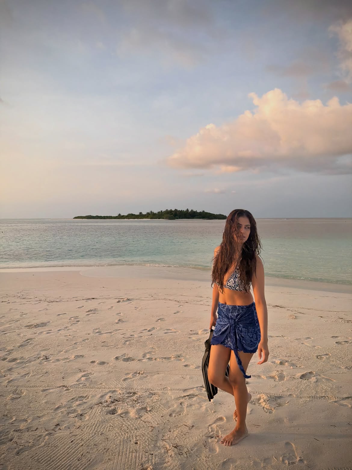 Malavika Mohanan Enjoying Vacation in Beach