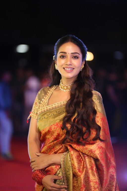 Nivetha Pethuraj Stunning Looks in Saree at Aadarsha Kutumbam Pre Release Event