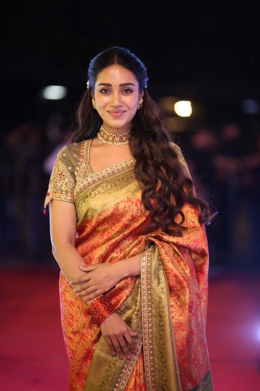 Nivetha Pethuraj Stunning Looks in Saree at Aadarsha Kutumbam Pre Release Event