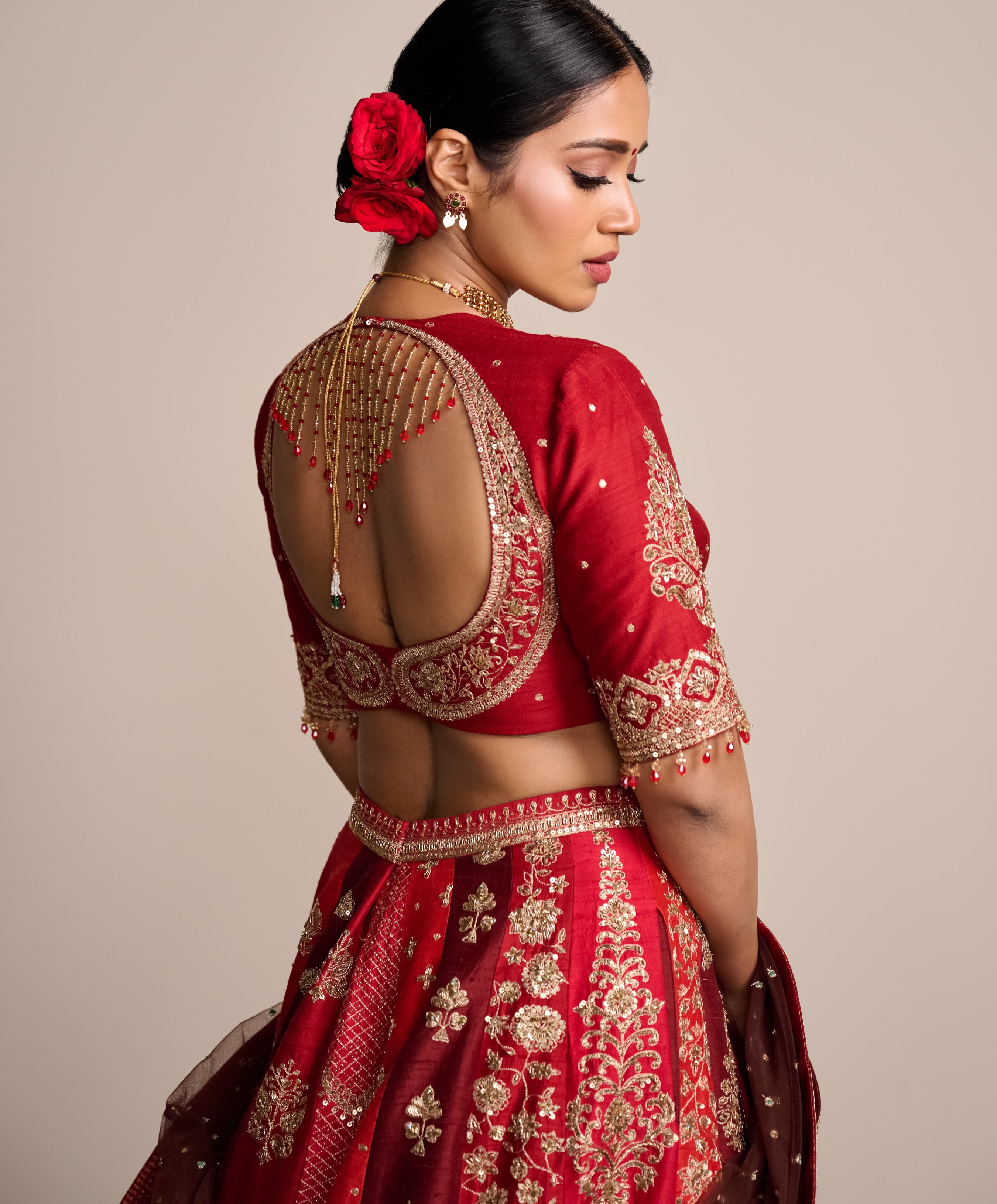 Nivetha Pethuraj Shines in Red Lehenga