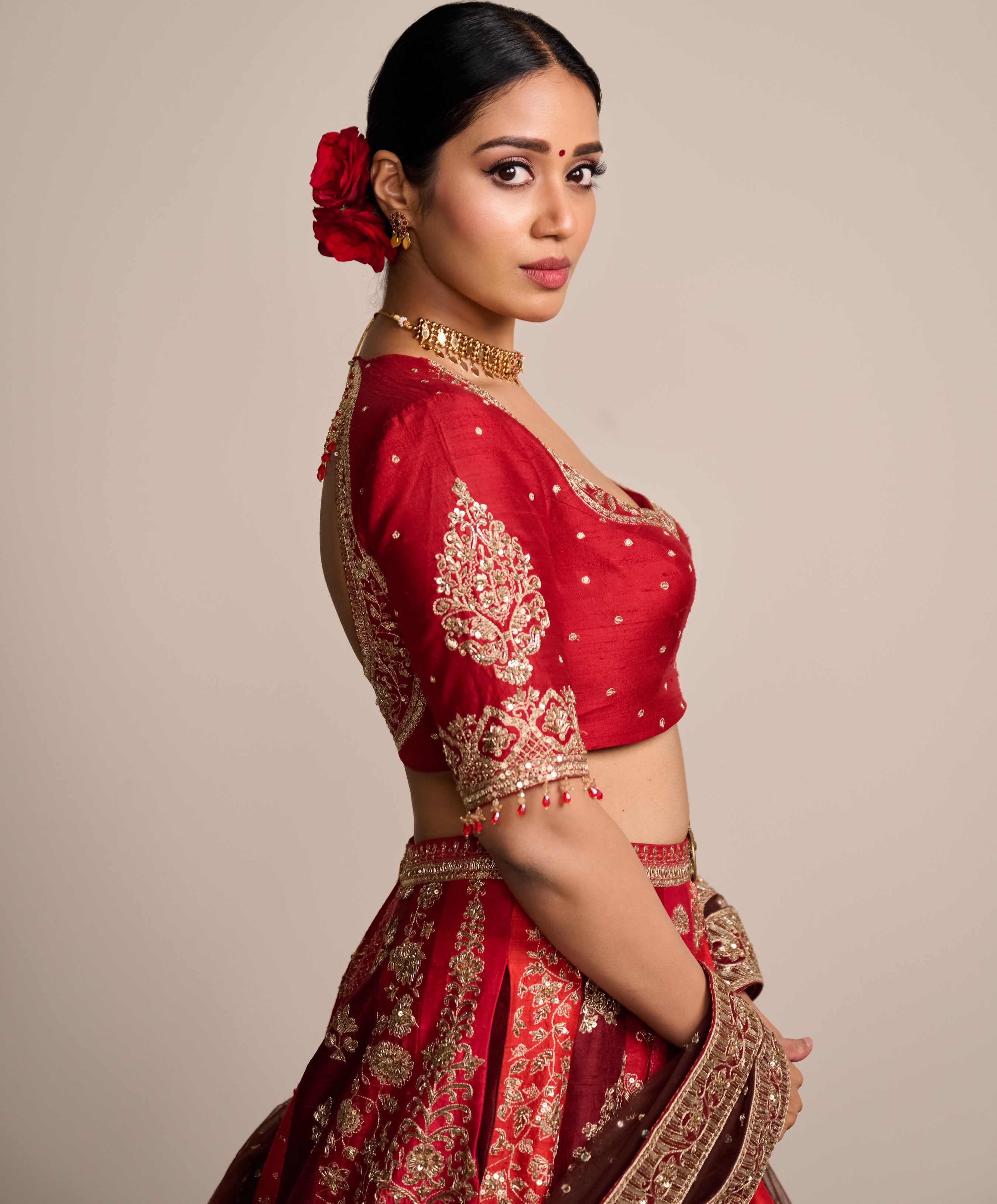 Nivetha Pethuraj Shines in Red Lehenga