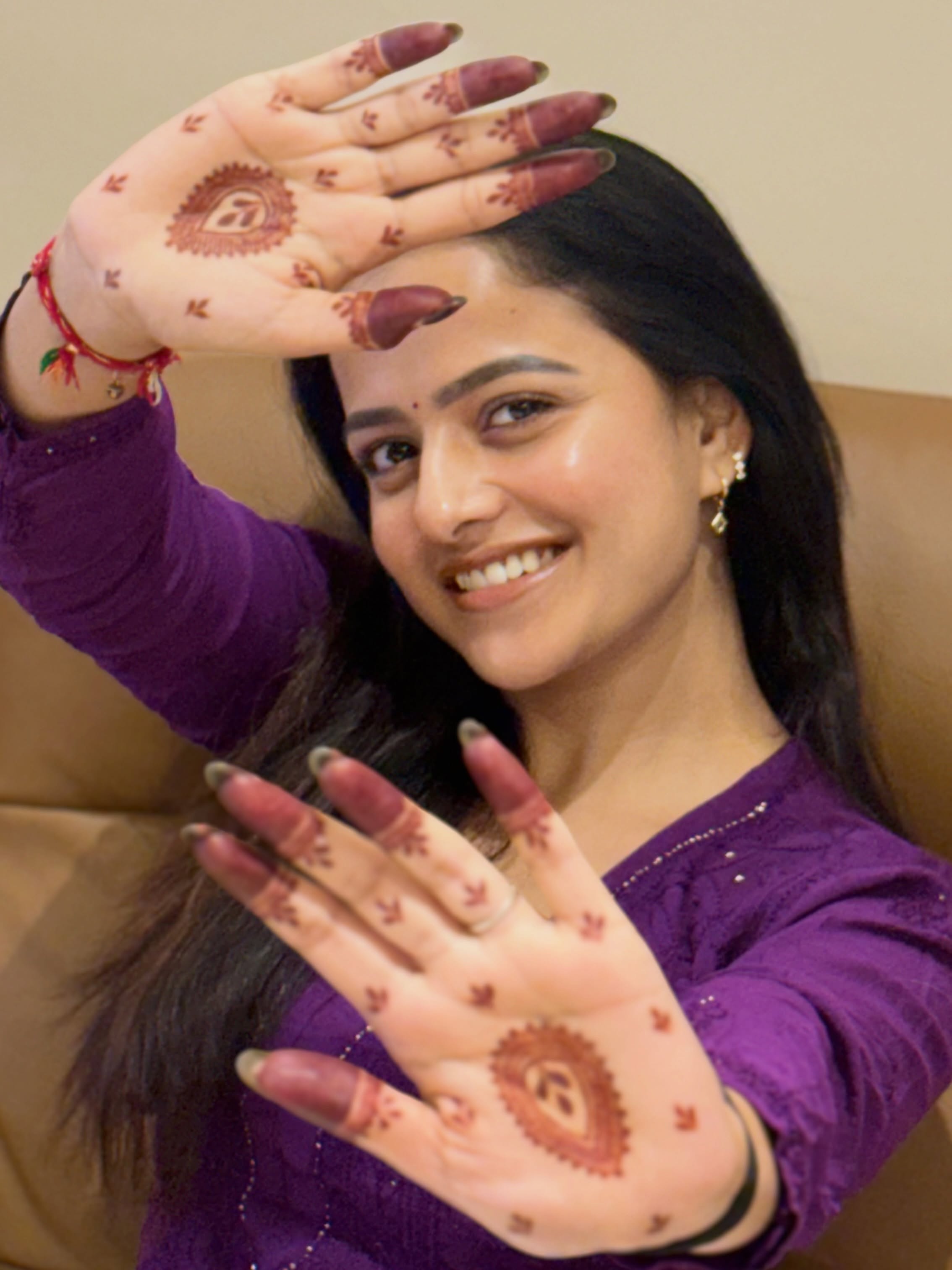 Vaishnavi Chaitanya Poses with Mehendi
