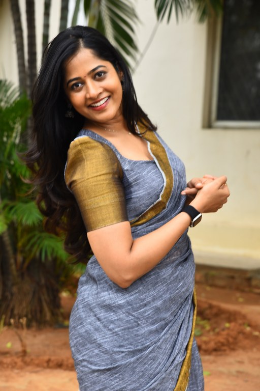 Shravani Reddy Stunning Looks in Saree at Rudravanam PS
