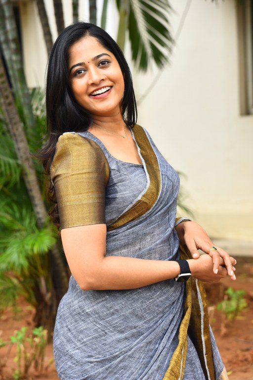 Shravani Reddy Stunning Looks in Saree at Rudravanam PS